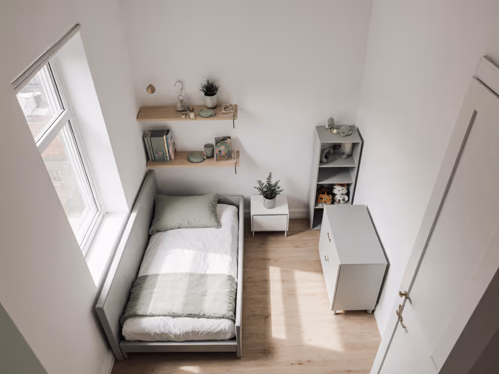 urban_apartment_nursery_layout_with_toddler_bed